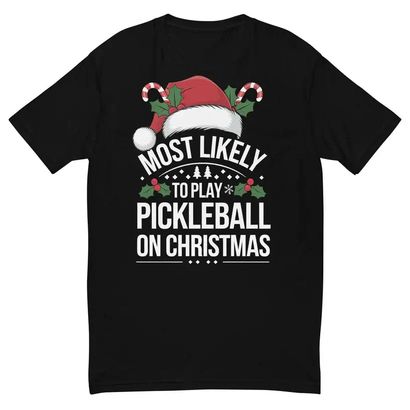 Festive Christmas pickleball tee with Santa hat and candy canes, text "Most Likely To Play Pickleball on Christmas" in white.