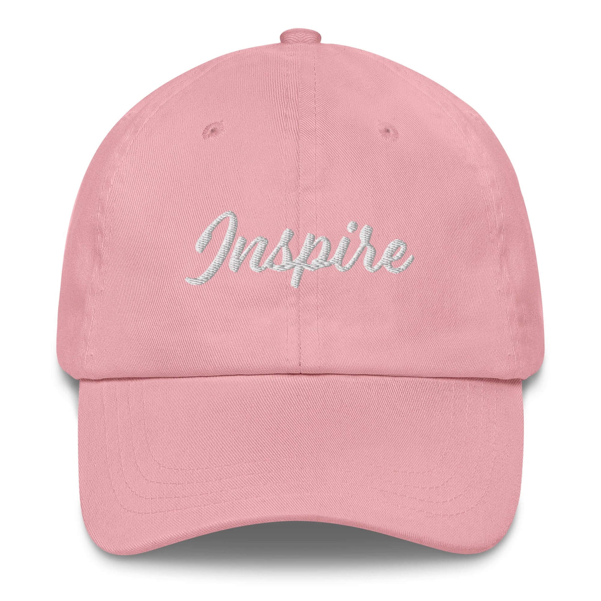 Stylish pink hat with 'Inspire' embroidered across the front, perfect for daily motivation and outdoor activities.