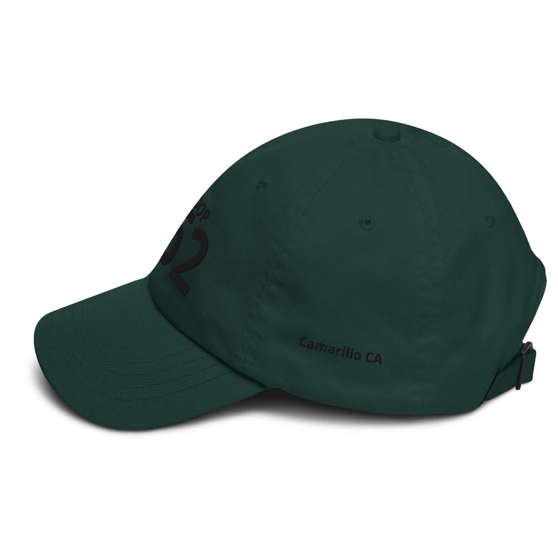 Adjustable green camo hat with curved visor and embroidered details, perfect for casual wear.