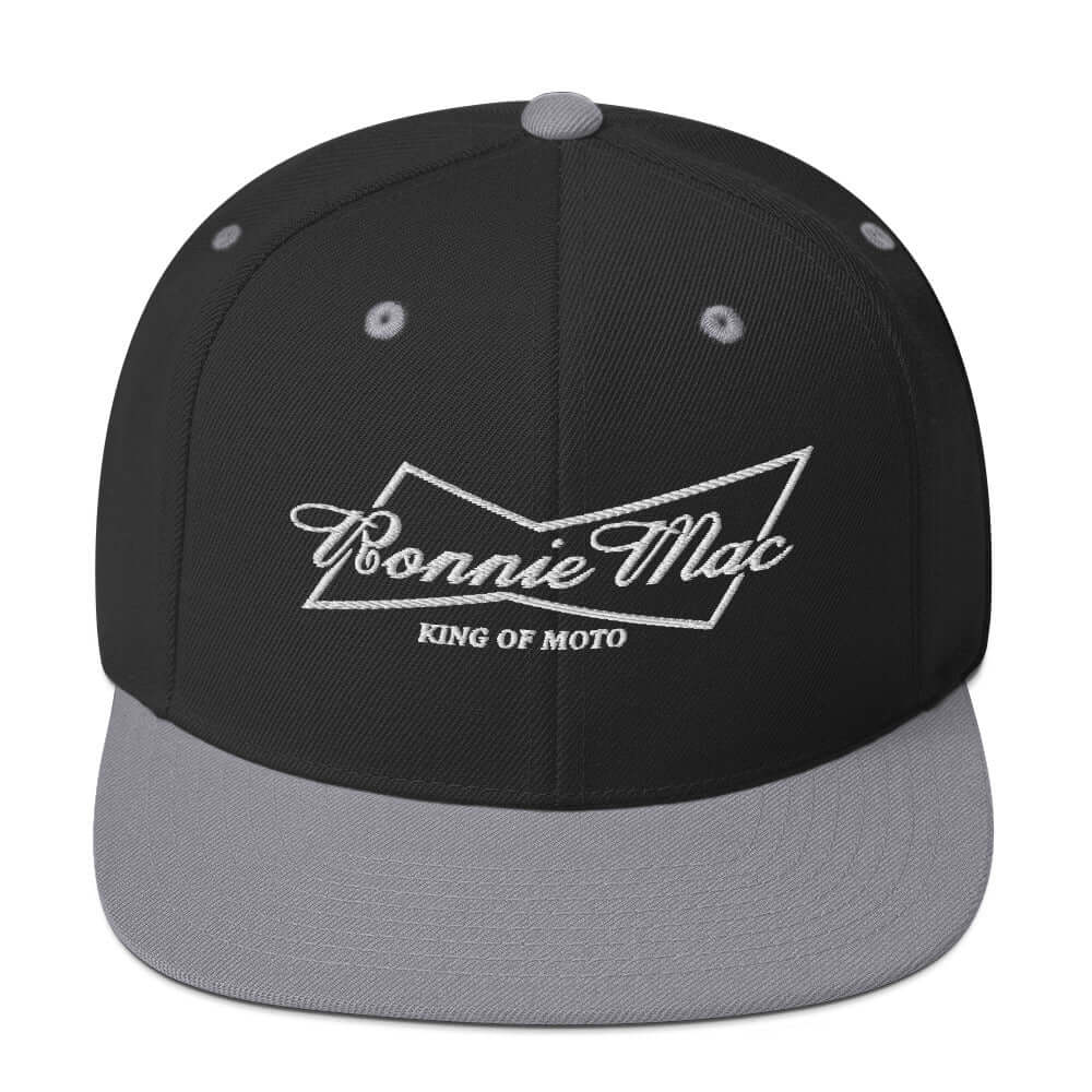 King of Moto embroidered snapback hat with flat brim featuring Ronnie Mac logo, ideal for motocross fans.