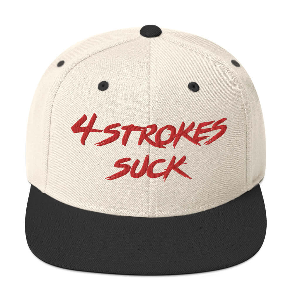 "4-Strokes Suck embroidered snapback hat in cream and black, inspired by motocross lifestyle and 2-stroke engines."