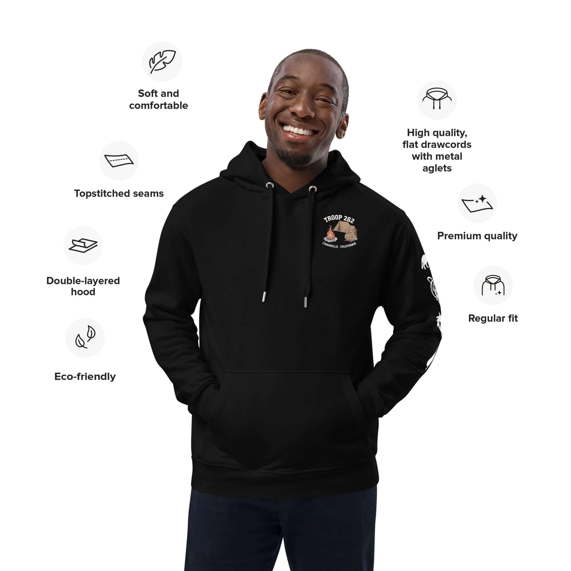 Smiling man wearing Adult Premium Eco Hoodie - Camping Edition with eco-friendly features and stylish design.