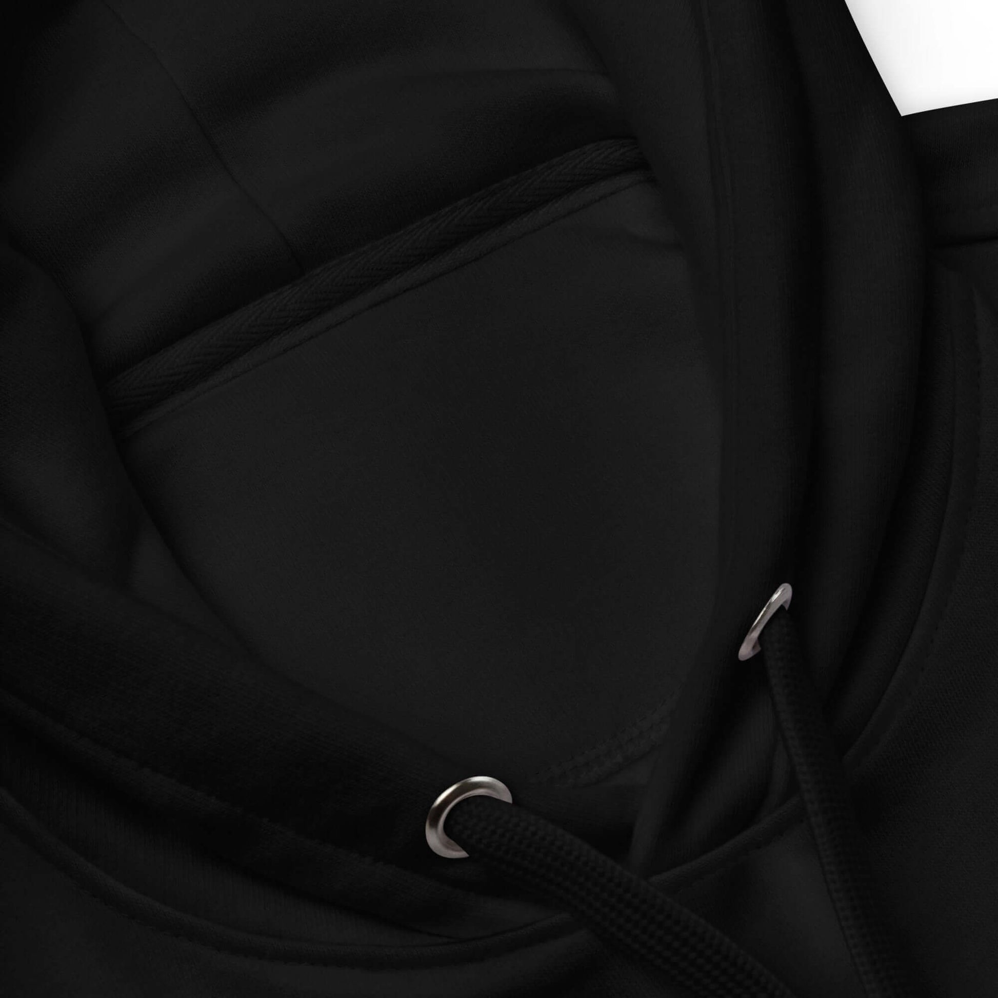 Inside view of the Adult Premium Eco Hoodie in black, showcasing its soft interior and drawstrings.