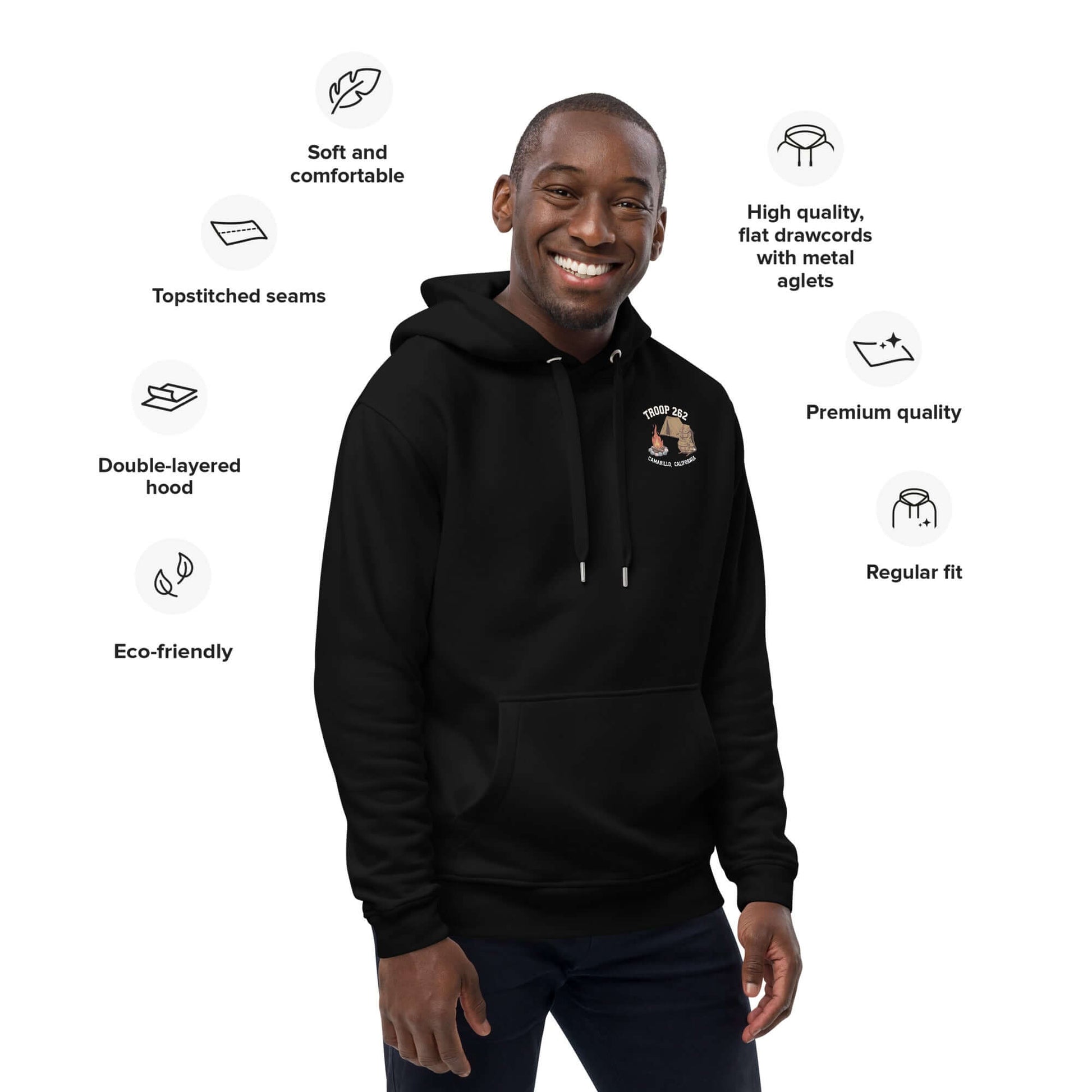 Smiling man wearing Adult Premium Eco Hoodie – Camping Edition, showcasing eco-friendly features and comfort.