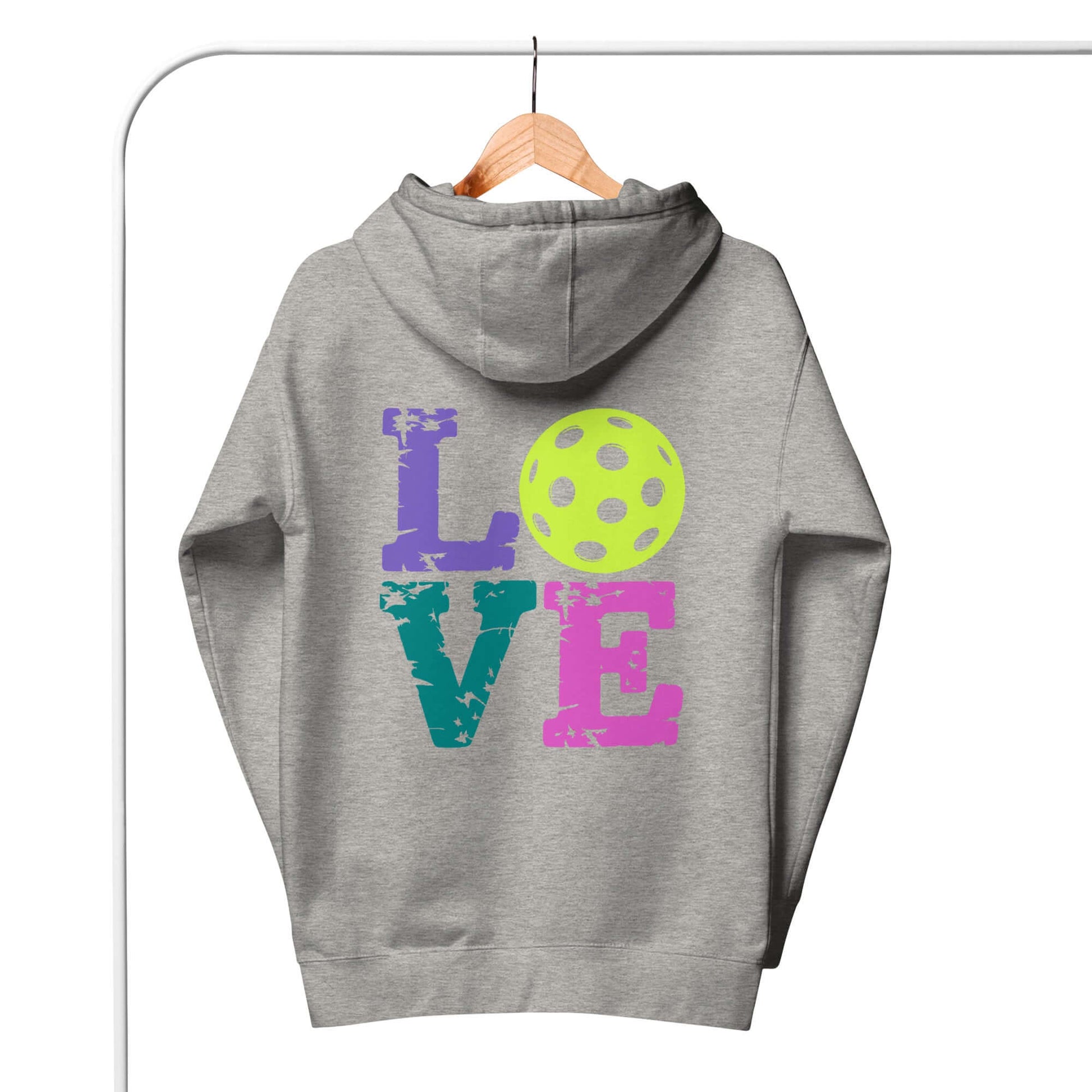 Back view of Women’s LOVE Pickleball Hoodie featuring colorful text and a pickleball graphic.