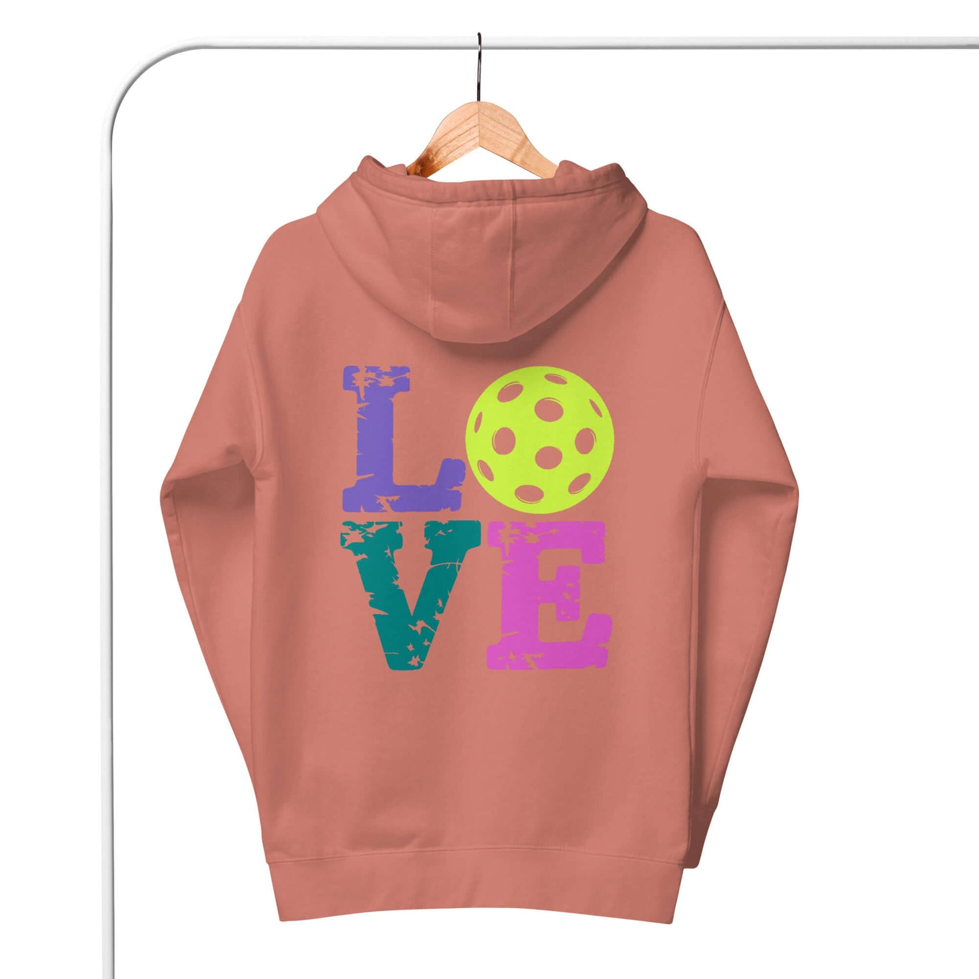 Women’s LOVE Pickleball Hoodie in coral with colorful lettering and pickleball graphic on the back.