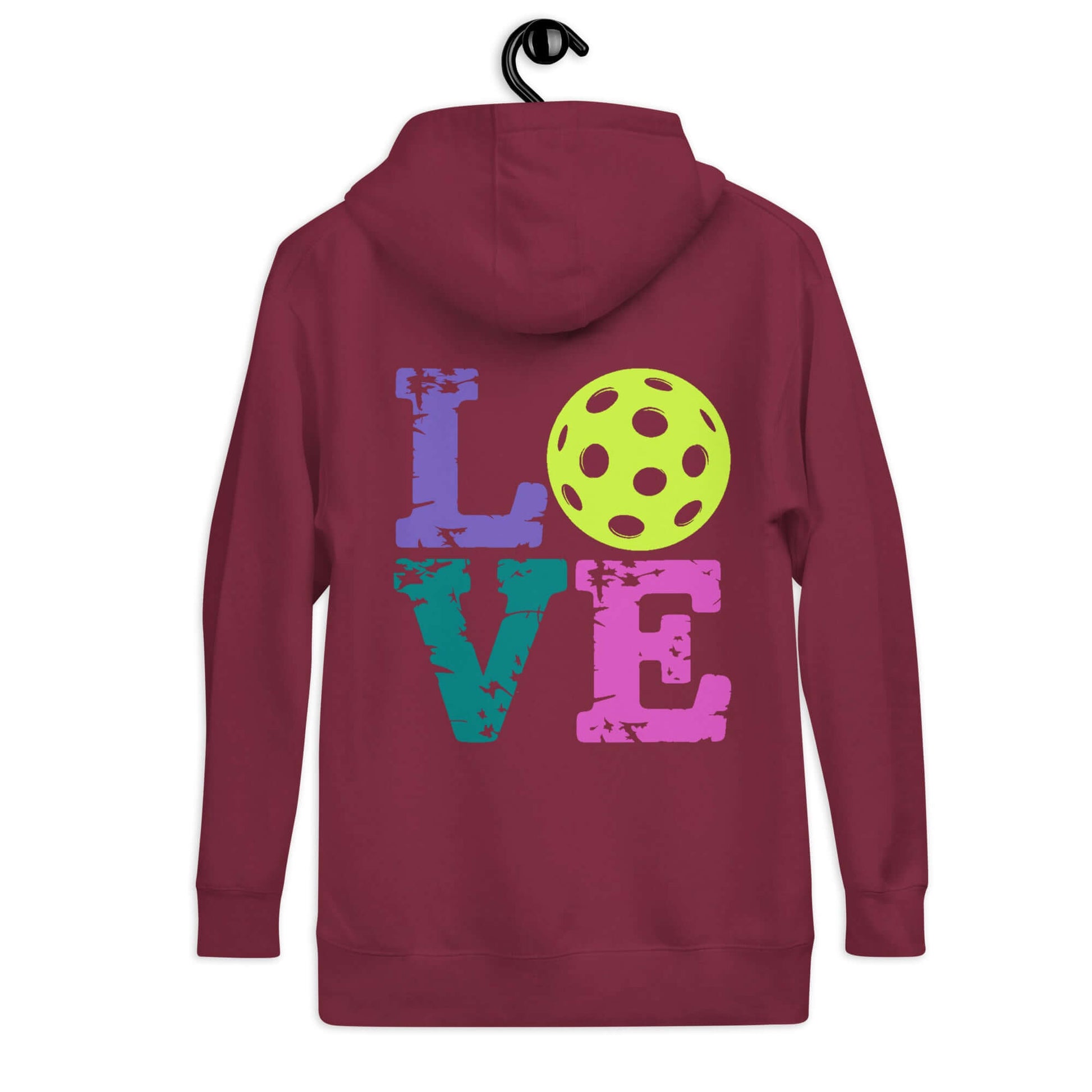 Back view of Women's LOVE Pickleball Hoodie featuring colorful lettering and a pickleball design on a maroon background.