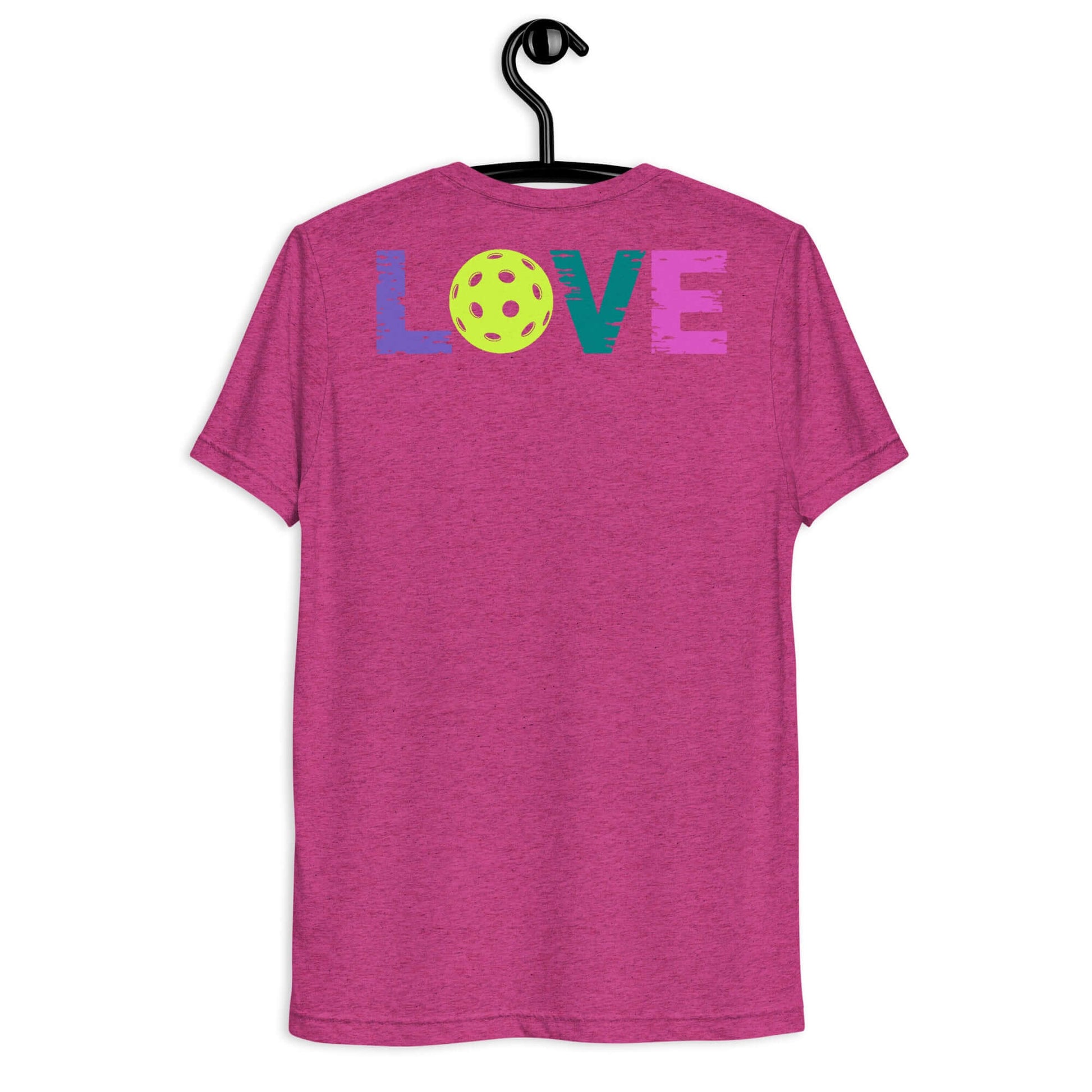 Pink Women’s LOVE Pickleball Short Sleeve Shirt showcasing vibrant colorful letters and pickleball design on the back.