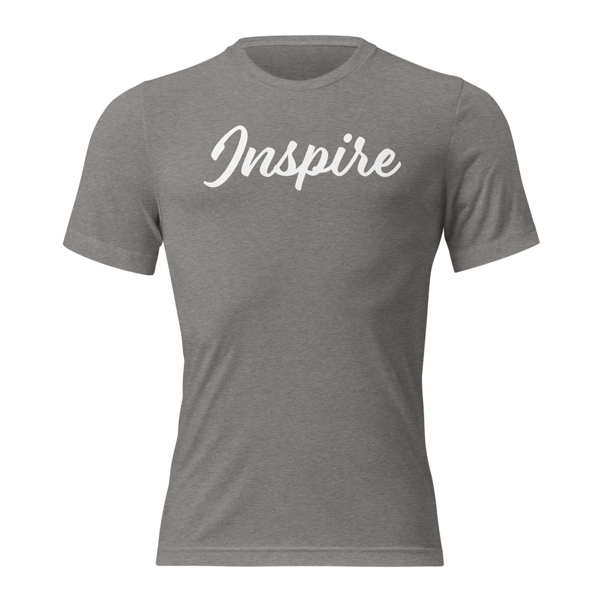 Women's gray t-shirt featuring the word 'Inspire' in elegant script, promoting positivity and self-motivation.