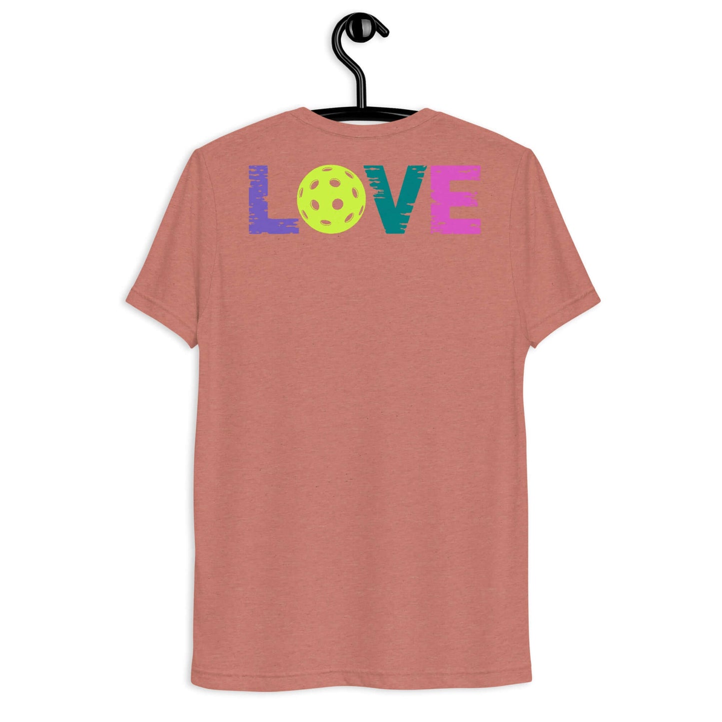 Back view of Women’s LOVE Pickleball Short Sleeve Shirt in coral color with colorful 'LOVE' design.