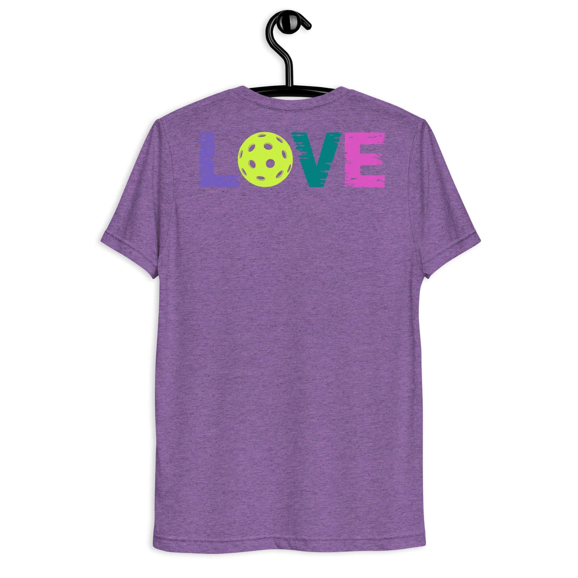 Back view of Women’s LOVE Pickleball Short Sleeve Shirt in purple with colorful text and pickleball graphic.