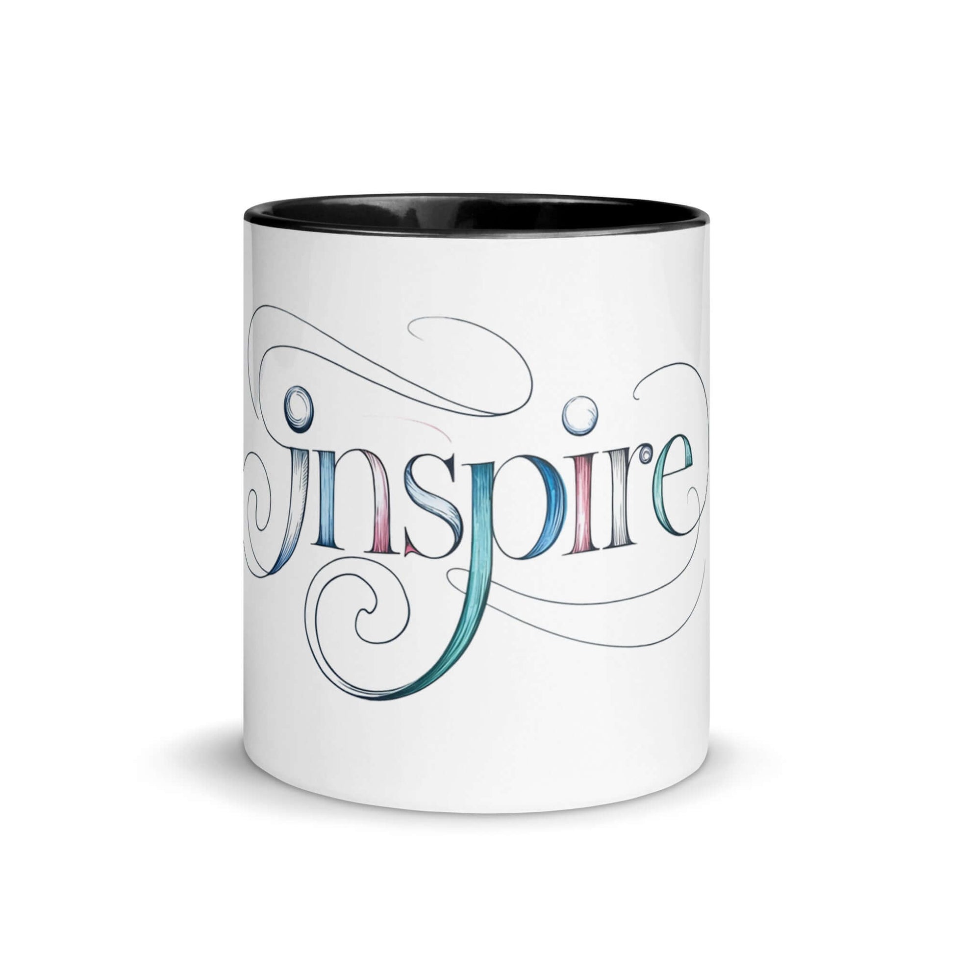 Inspire Sketch Mug showcasing elegant word art design with vibrant colors inside. Perfect for creative mornings.