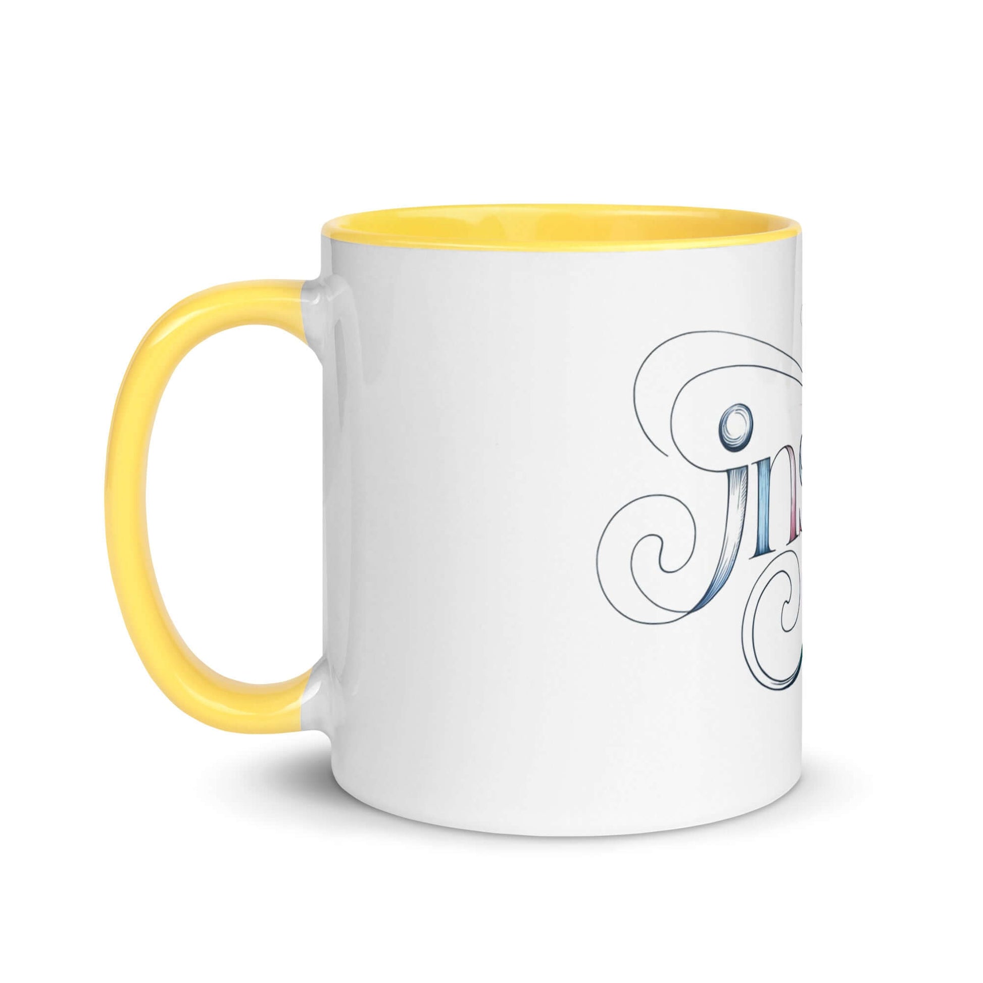 Inspire Sketch Mug with yellow interior, featuring elegant word art design of "Inspire" in intricate swirls.