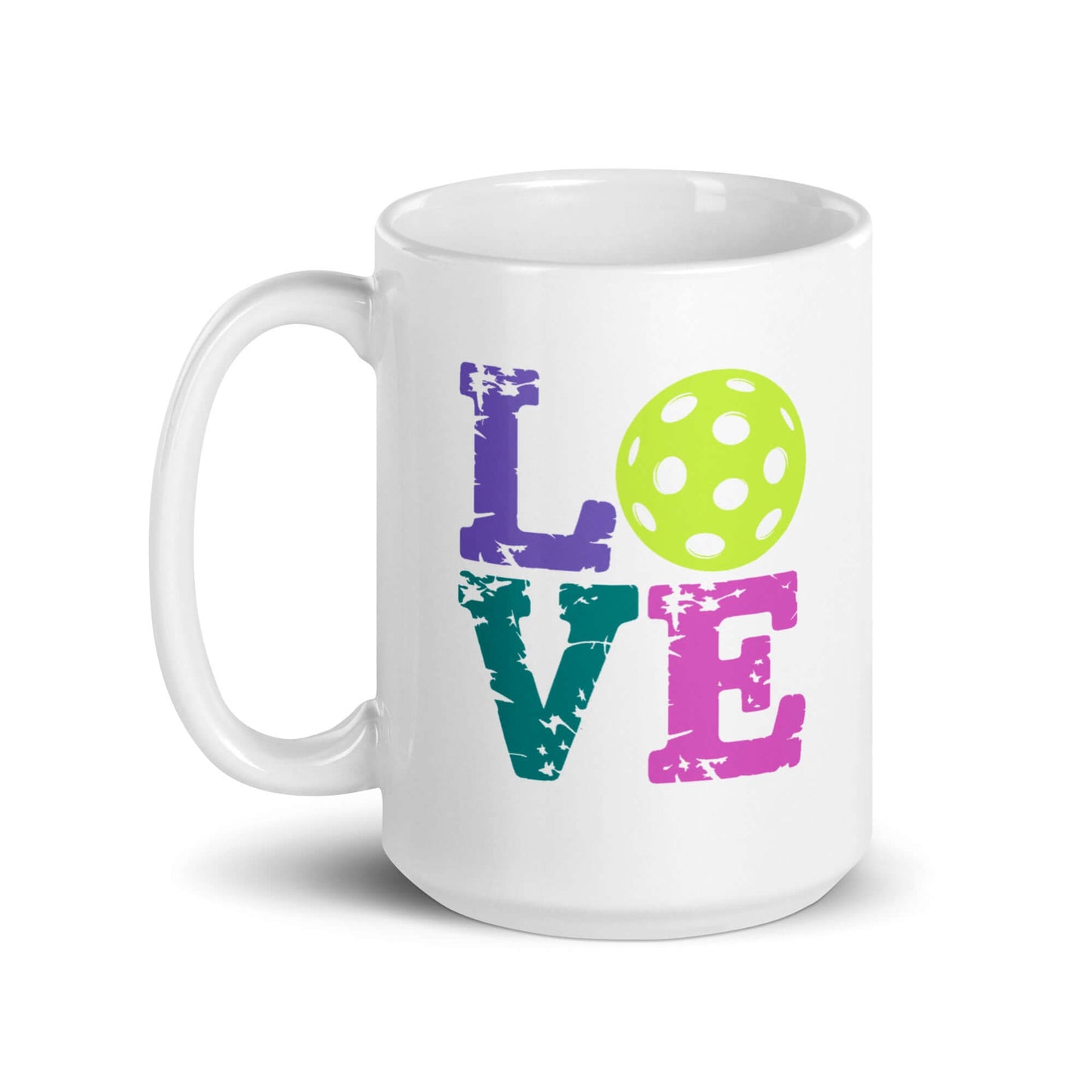 LOVE Pickleball white glossy mug with colorful text and a green polka dot pickleball design.