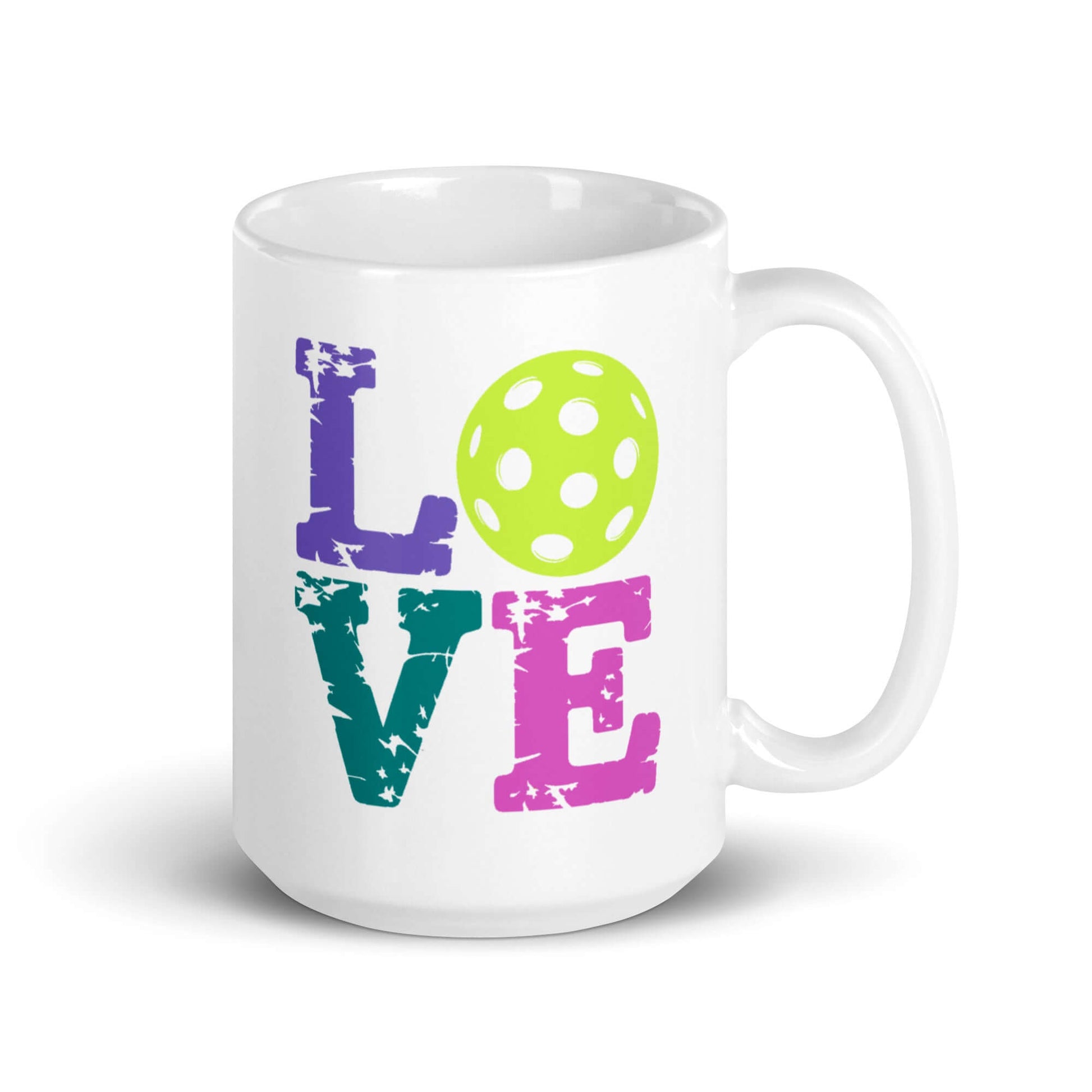 LOVE Pickleball white glossy mug with colorful text and a green polka dot ball design.