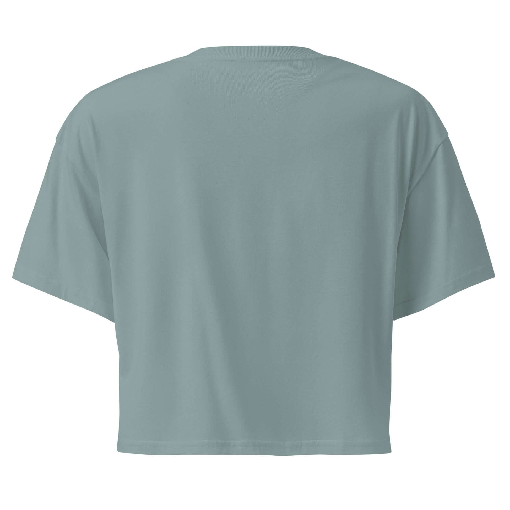 Back view of Inspire Sketch Women's Crop Top in soft green, showcasing a comfortable and relaxed fit.