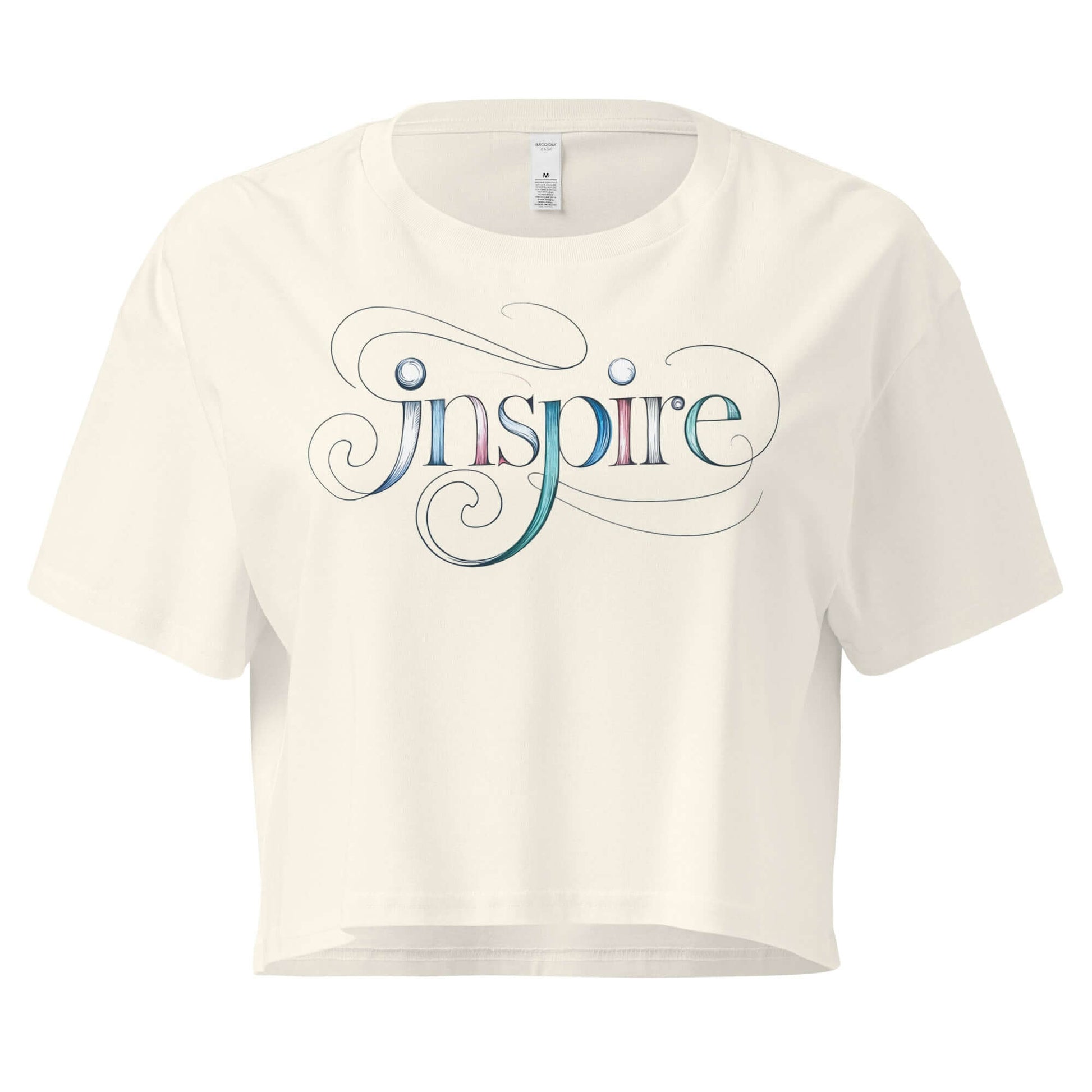 Women's Inspire Sketch Crop Top featuring elegant word art design in soft cream color, promoting creativity and comfort.