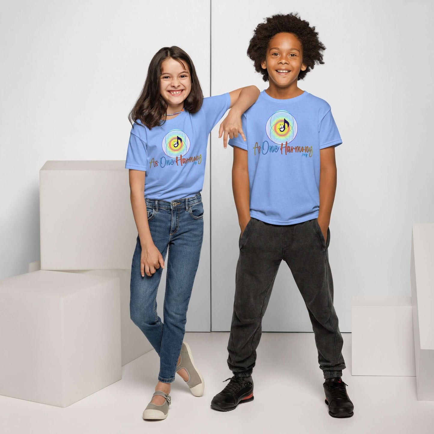 Kids wearing As One Harmony moisture-wicking t-shirts, perfect for active days, in a bright blue color.